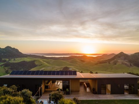 Solar panels on Raynes House at sunset, Kauri Mountain, Whangārei Heads